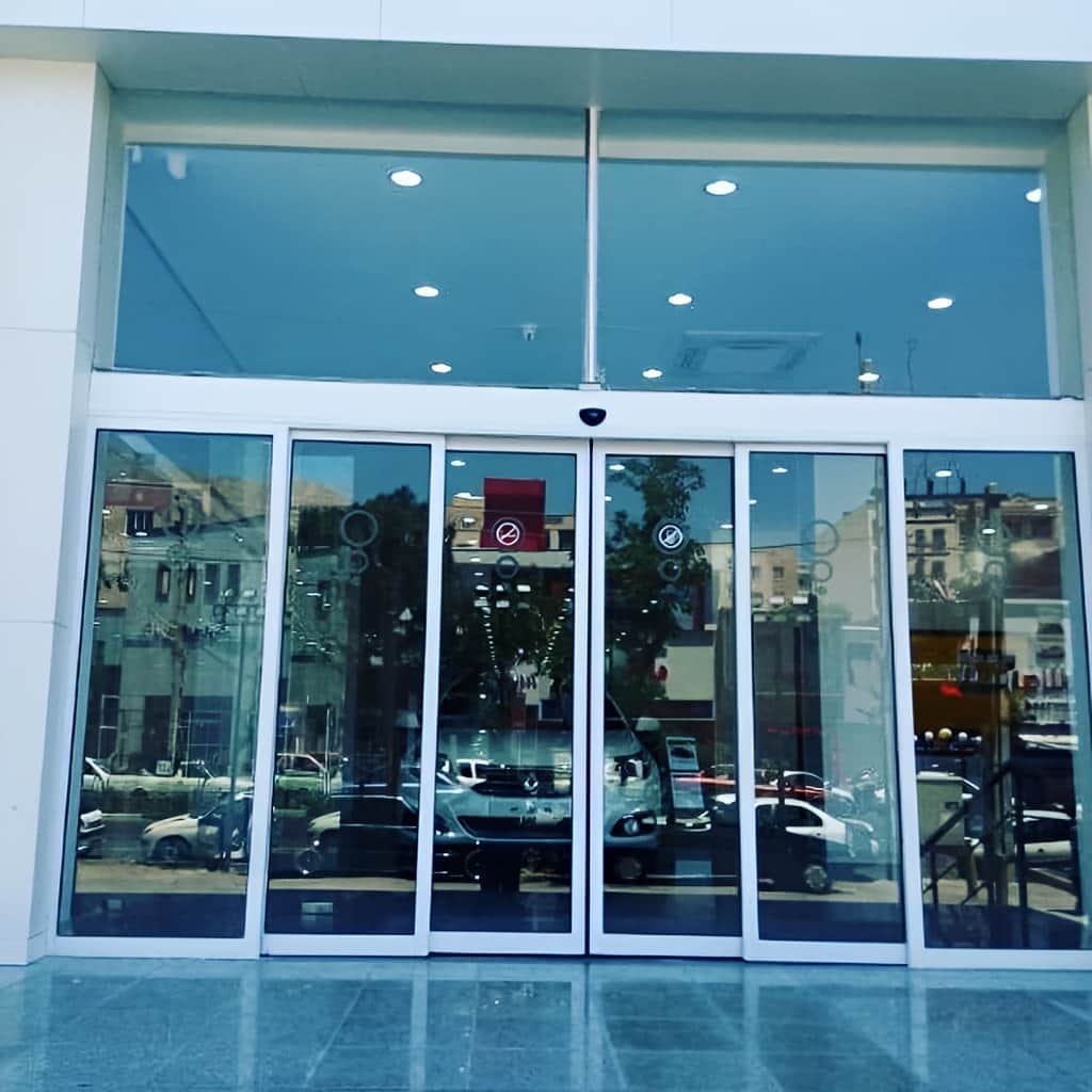 درب اتوماتیک شیشه ای با ریل حرکتی تراز