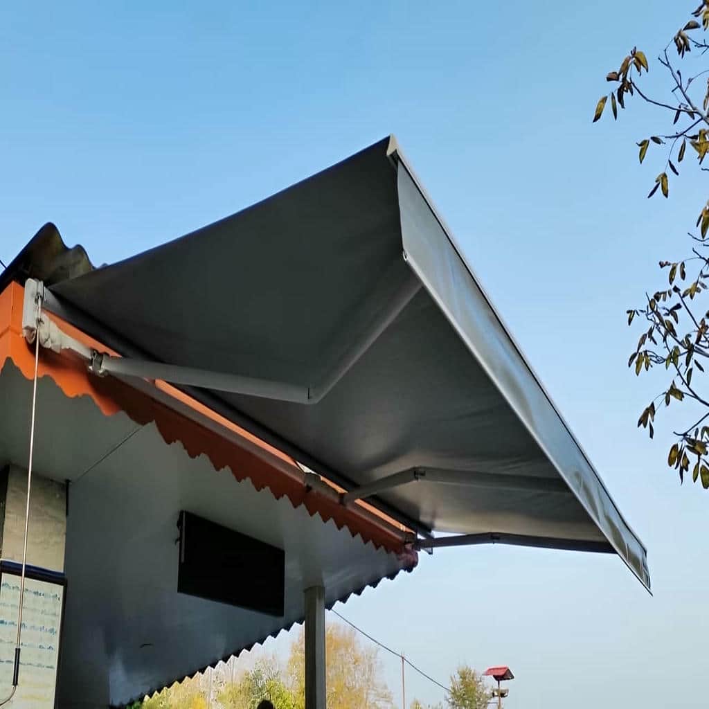 سایبان برقی در بندرعباس برای فضای آفتاب گیر ساختمان