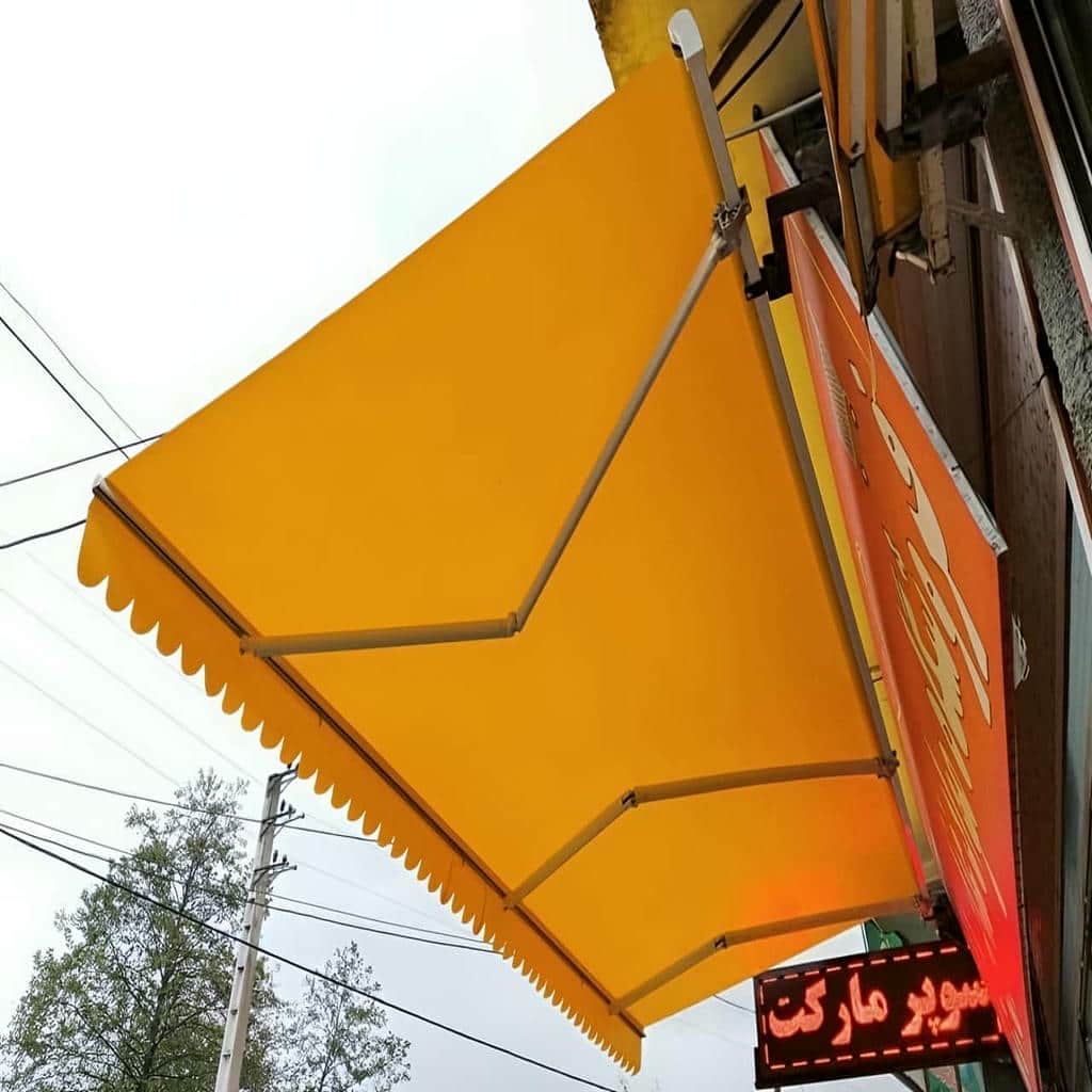 سایبان برقی در ایلام برای بالکن بنای قدیمی