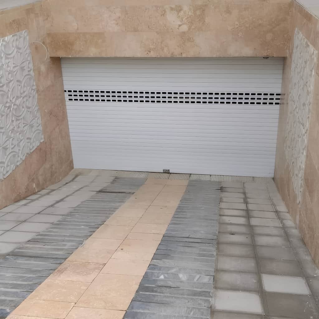 کرکره برقی ریموت دار برای پارکینگ ساختمان در تهران