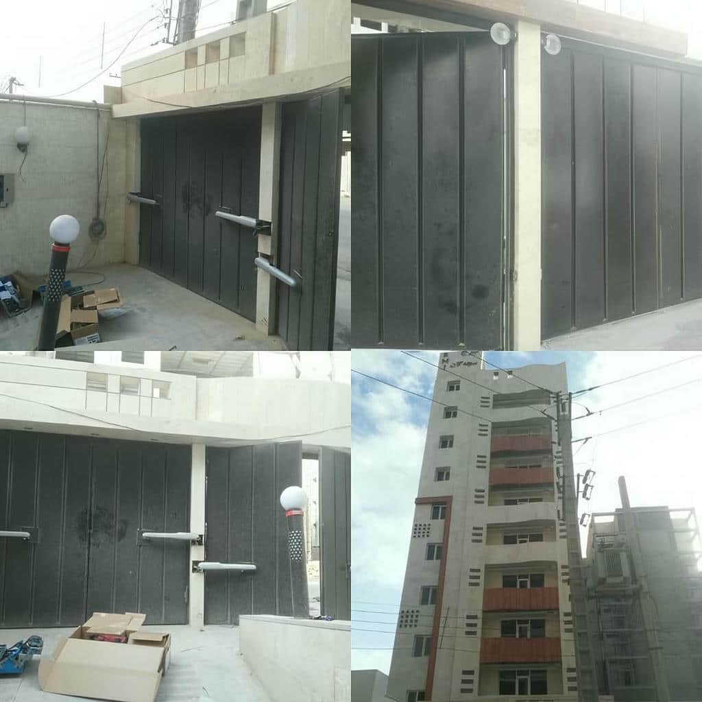 جک درب پارکینگ در شهرکرد با مدل بازویی روی درب فرفورژه